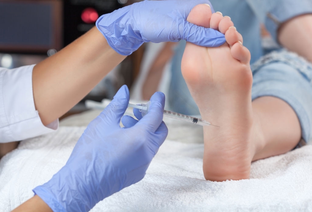 Podiatry Clinic In Queens Doing Injection